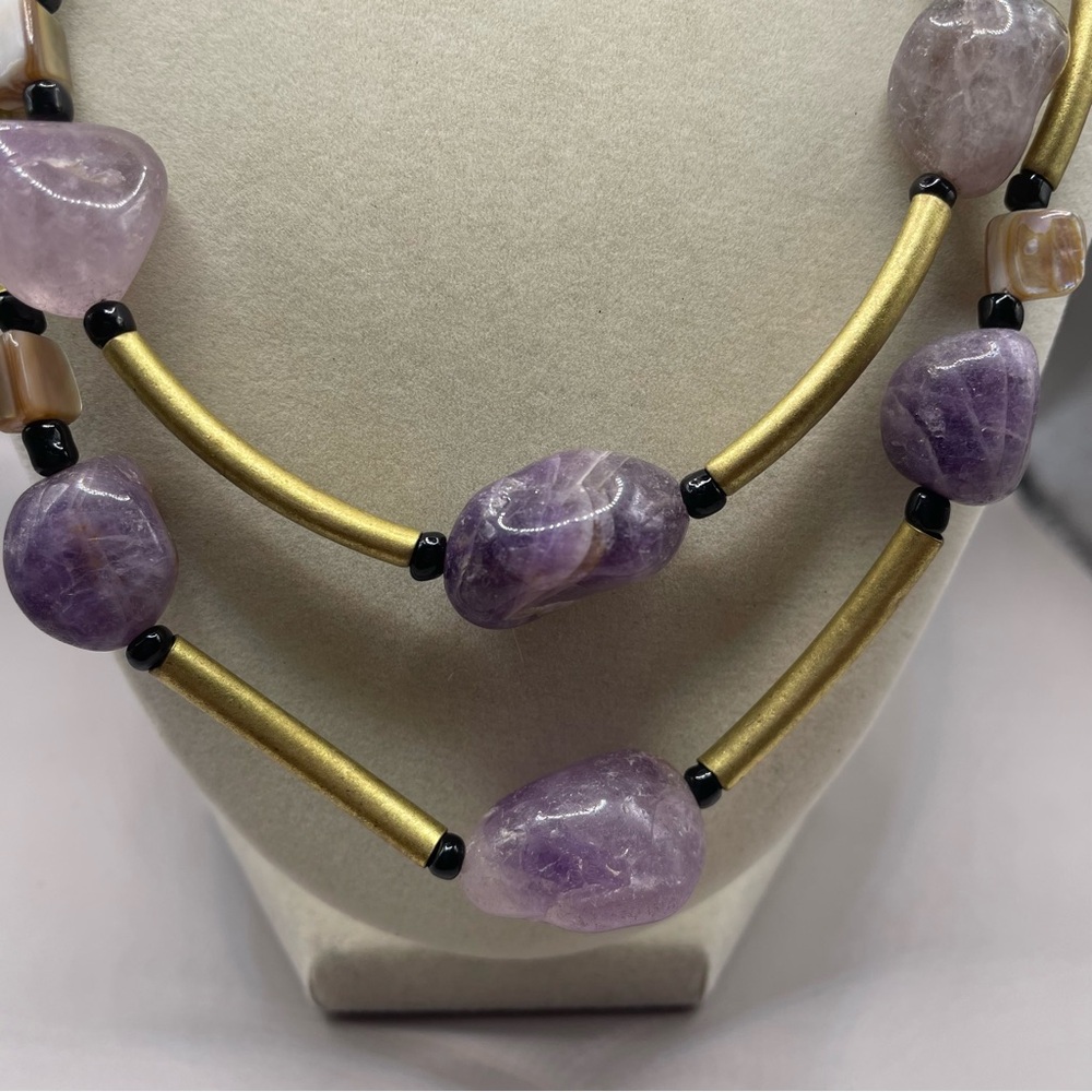 Vintage two strand purple stone and brass tone necklace. 22 inches. Colorful